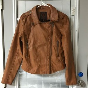 Very cute leather jacket. Dresser up or down . Looks good with jeans and boots.